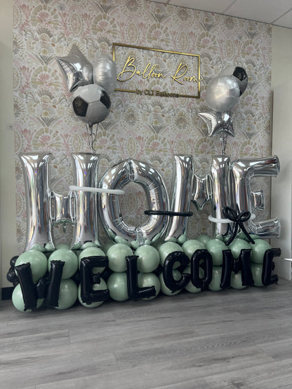 "Welcome Home" Balloon Bouquet with 6 Shape Balloons